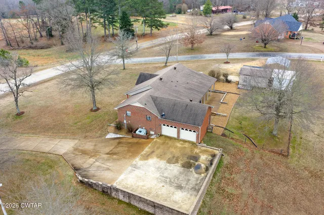 a view of a yard with an outdoor space