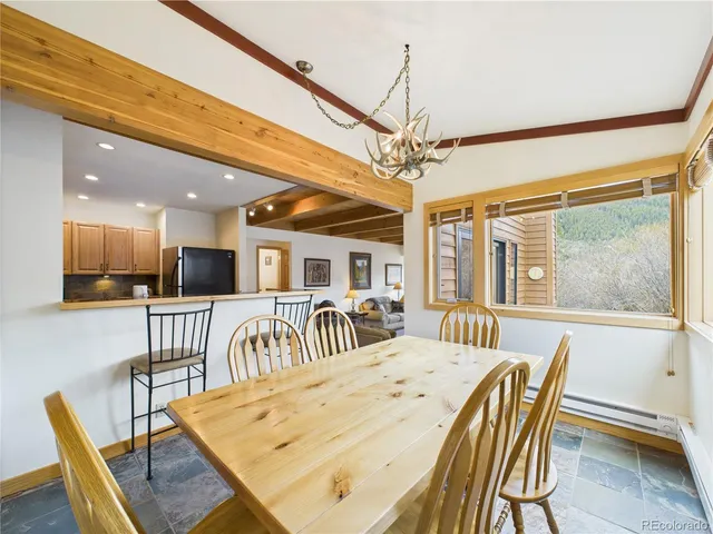 a living room with a bed and furniture