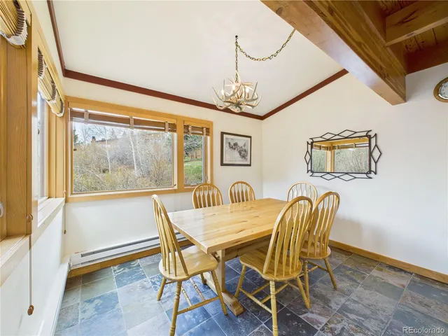 a bathroom with a sink a mirror and a window