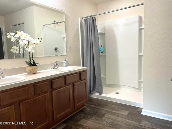 a bathroom with a sink and a mirror