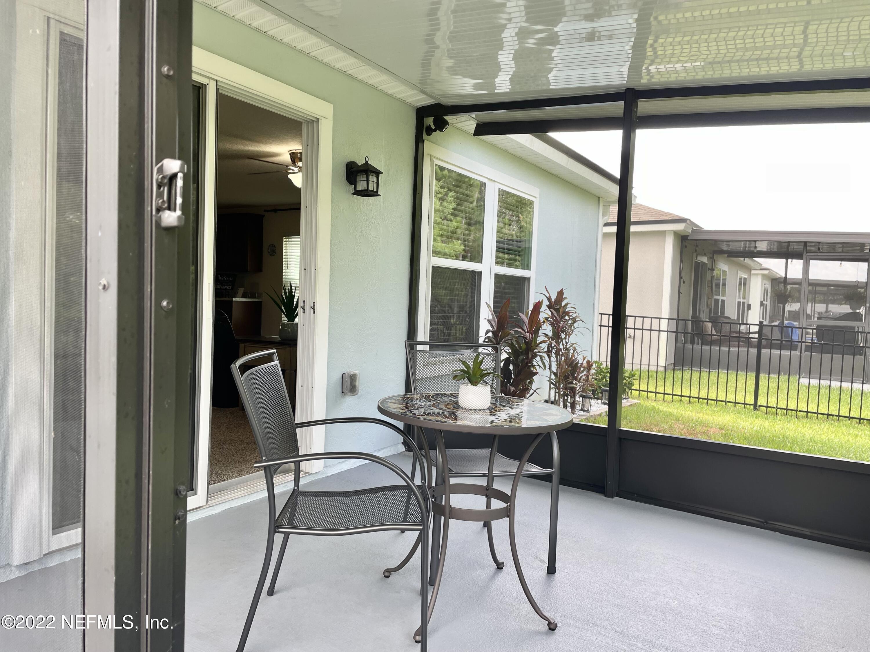 117 Lakeside Court Bunnell, FL 32110 - Photo 25 of 42 COVERED SCREENED LANAI