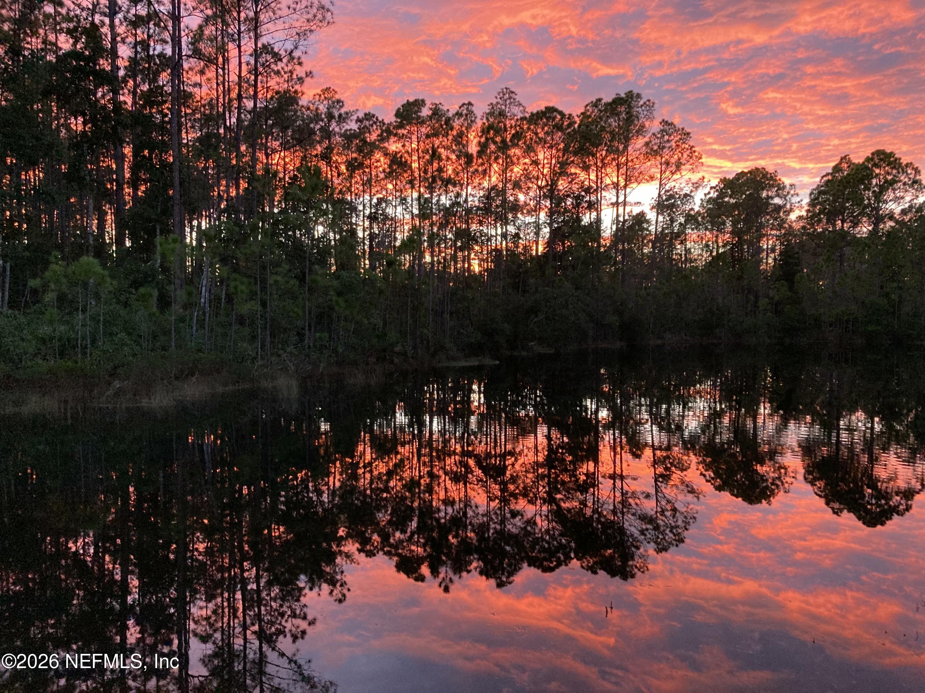 117 Lakeside Court Bunnell, FL 32110 - Photo 27 of 42 SUNSET PHOTO