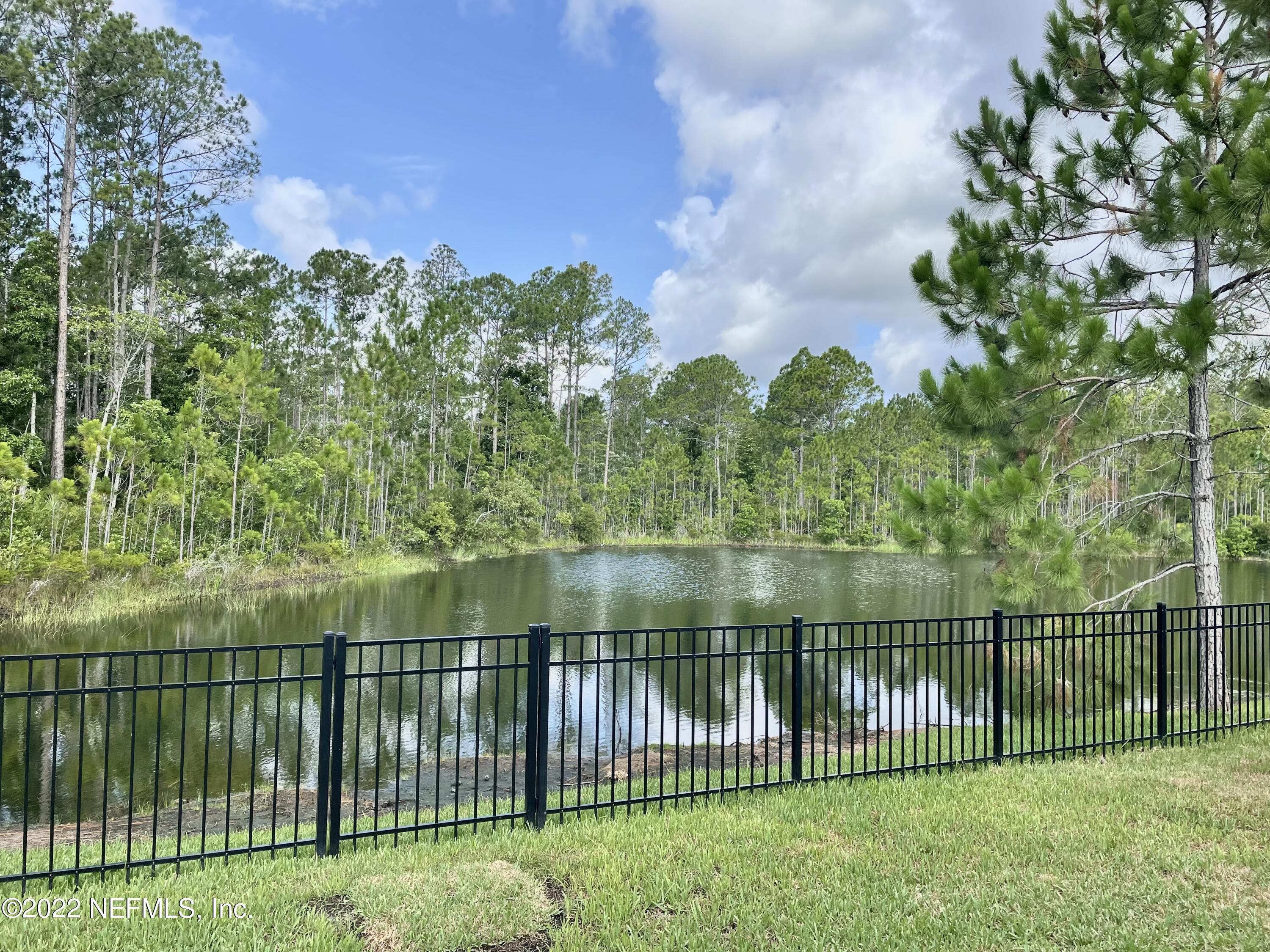 117 Lakeside Court Bunnell, FL 32110 - Photo 29 of 42 FENCED REAR WITH WATER VIEW