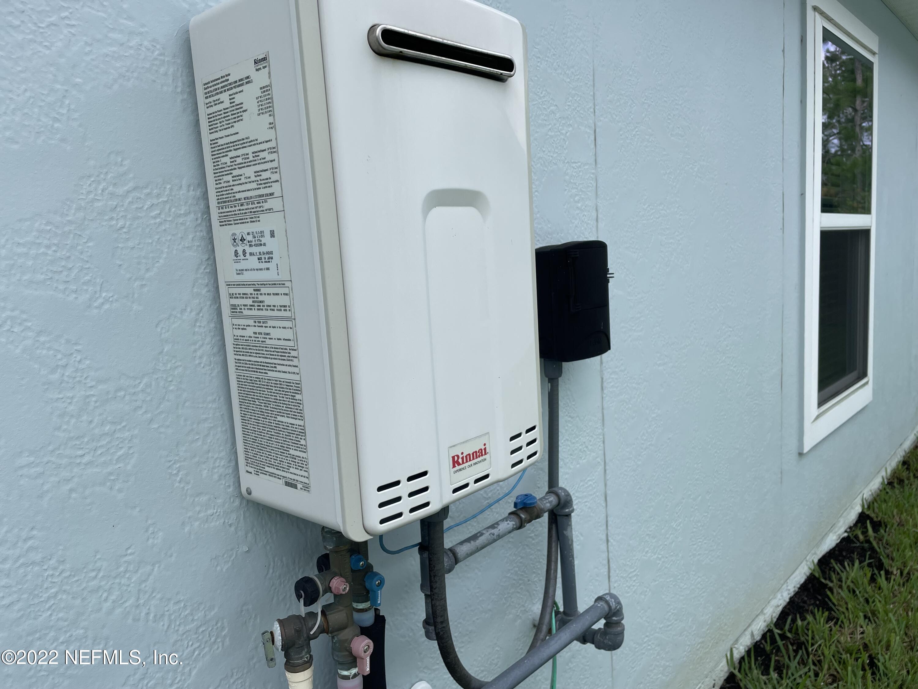117 Lakeside Court Bunnell, FL 32110 - Photo 32 of 42 TANKLESS WATER HEATER