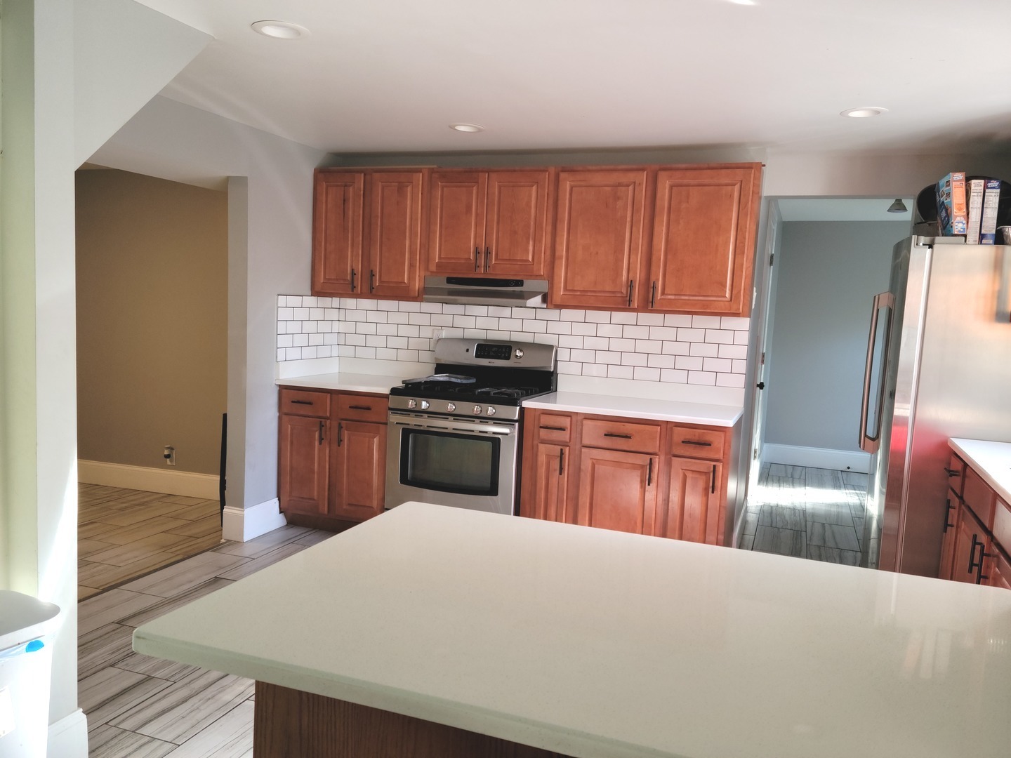286 Seabury Road Bolingbrook, IL 60440 - Photo 3 of 15 a kitchen with stainless steel appliances granite countertop a stove a sink and a refrigerator