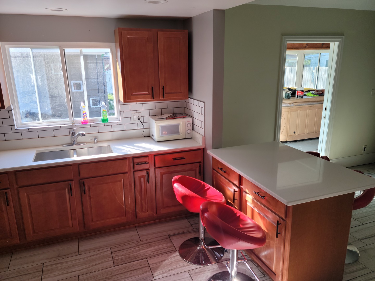 286 Seabury Road Bolingbrook, IL 60440 - Photo 6 of 15 a kitchen with a sink cabinets and wooden floor