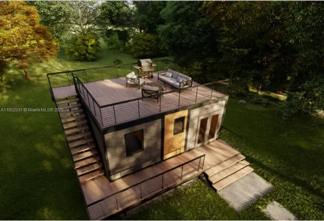 a view of a patio with table and chairs with wooden floor and fence