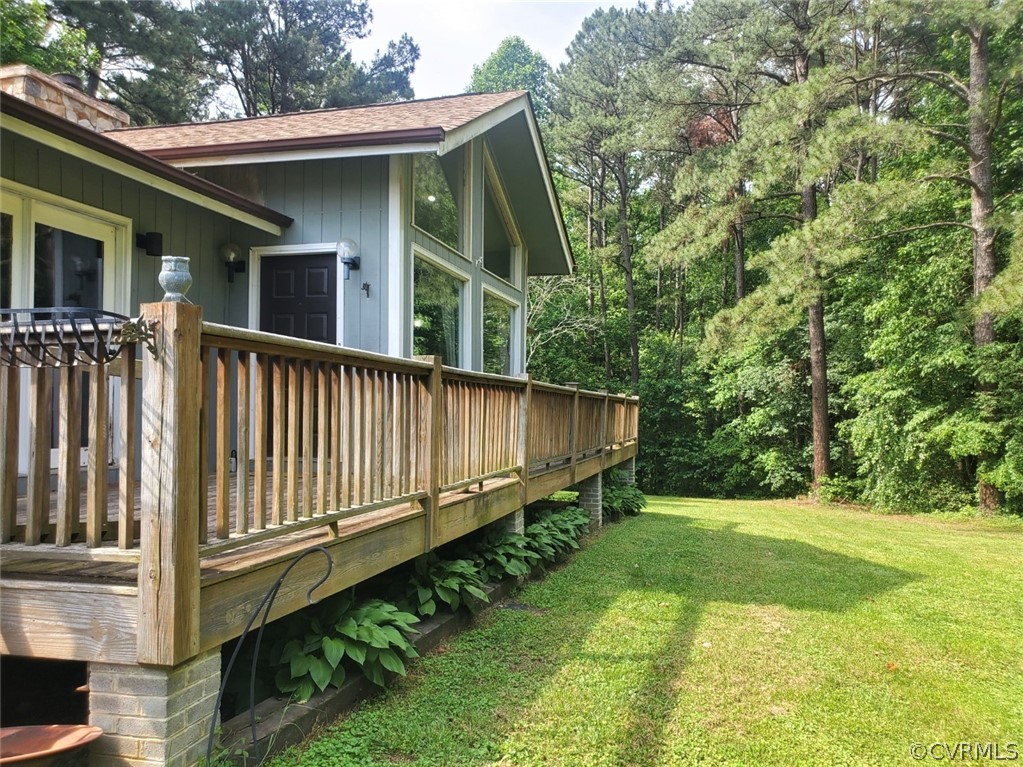17528 Old Ridge Road Montpelier, VA 23192 - Photo 9 of 19 a view of backyard with barbeque grill and wooden fence