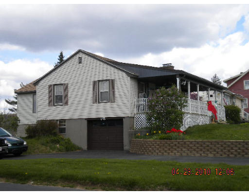 13 Mt Avenue Worcester, MA 01606 - Photo 1 of 1 a front view of a house with a garden