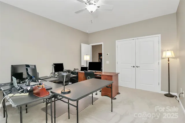 a workspace with furniture and wooden floor