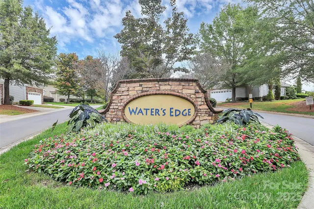 a view of a park that has large trees