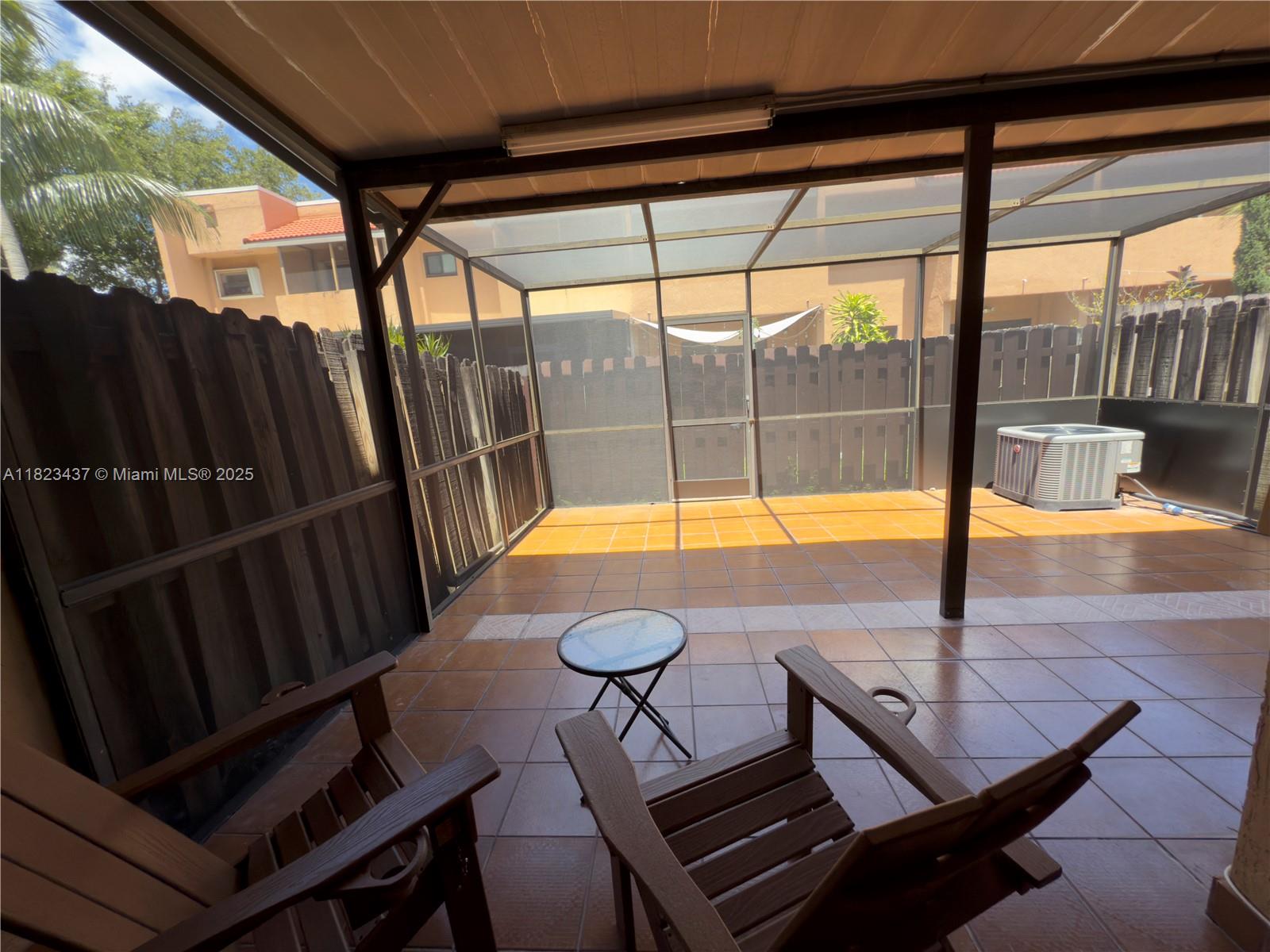 1651 Southwest 120th Avenue Pembroke Pines, FL 33025 - Photo 15 of 34 a view of a swimming pool with a patio