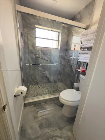 a bathroom with a window
