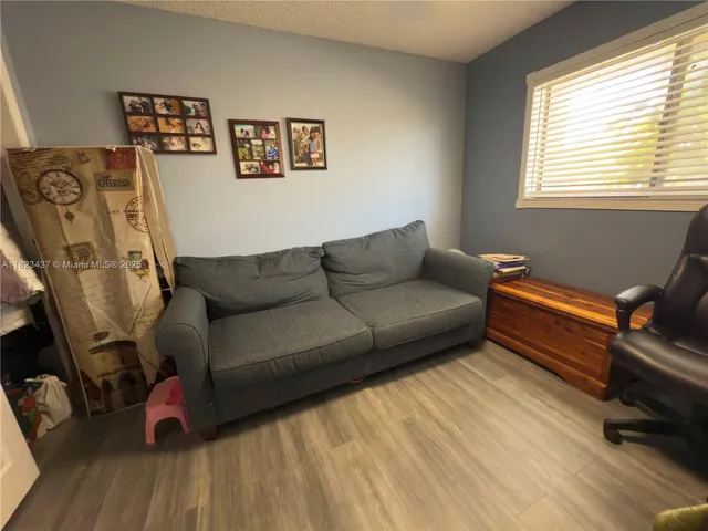 a view of a hallway with windows