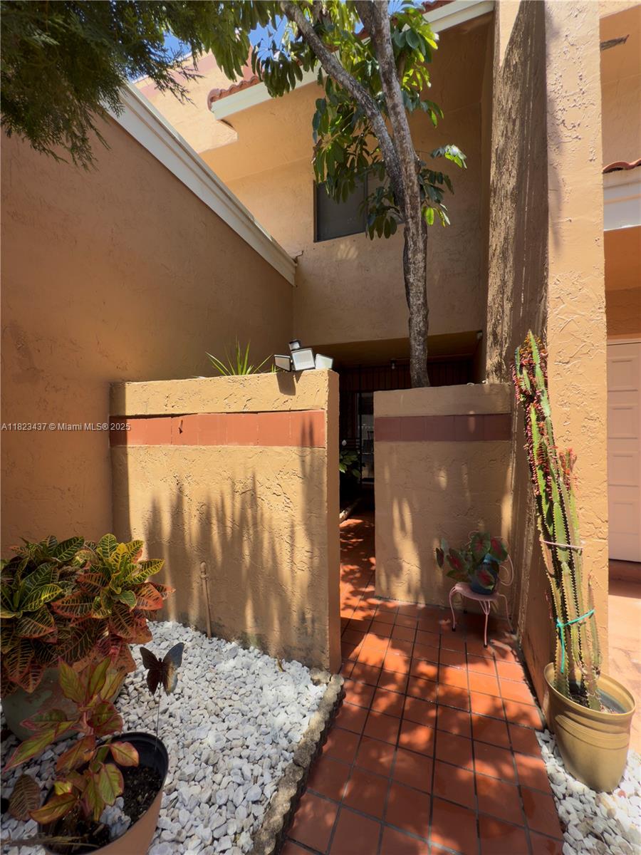 1651 Southwest 120th Avenue Pembroke Pines, FL 33025 - Photo 3 of 34 a backyard of a house with lots of green space