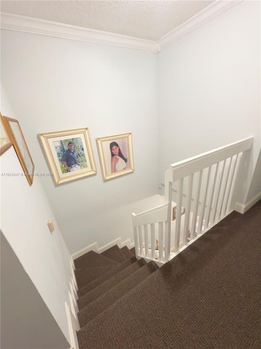 1651 Southwest 120th Avenue Pembroke Pines, FL 33025 - Photo 31 of 34 a view of a hallway with windows