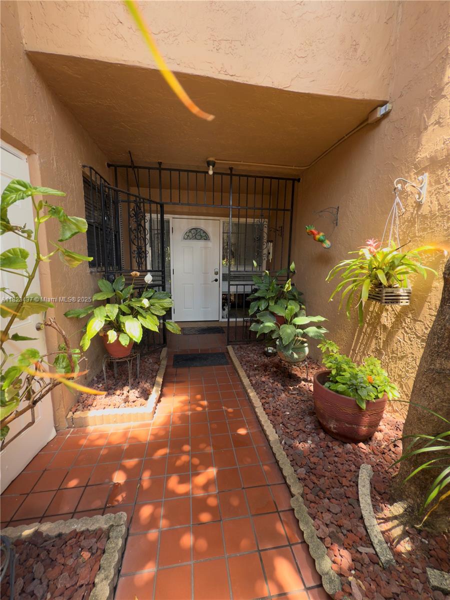 1651 Southwest 120th Avenue Pembroke Pines, FL 33025 - Photo 4 of 34 a view of a chairs and table in a patio