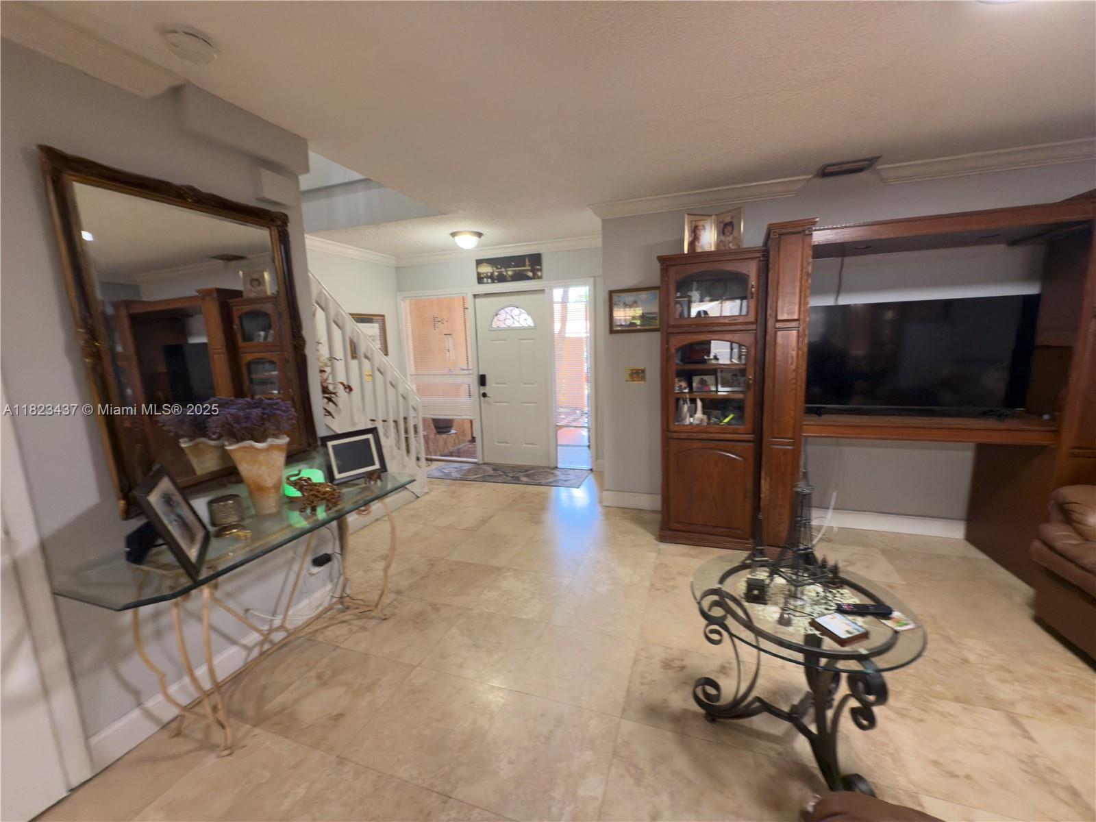 1651 Southwest 120th Avenue Pembroke Pines, FL 33025 - Photo 5 of 34 a living room with furniture