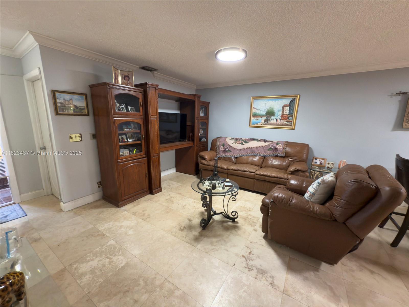 1651 Southwest 120th Avenue Pembroke Pines, FL 33025 - Photo 7 of 34 a living room with furniture