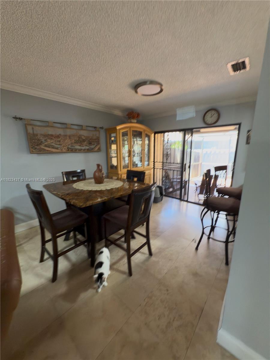 1651 Southwest 120th Avenue Pembroke Pines, FL 33025 - Photo 10 of 34 a workspace with furniture and a large window