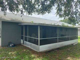 1055 Marlin Drive Rockledge, FL 32955 - Photo 13 of 14 a view of a backyard