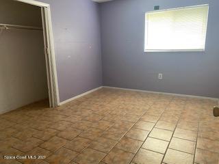 1055 Marlin Drive Rockledge, FL 32955 - Photo 8 of 14 a view of an empty room with a window