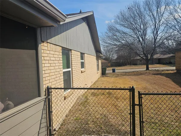 a view of the back yard of the house