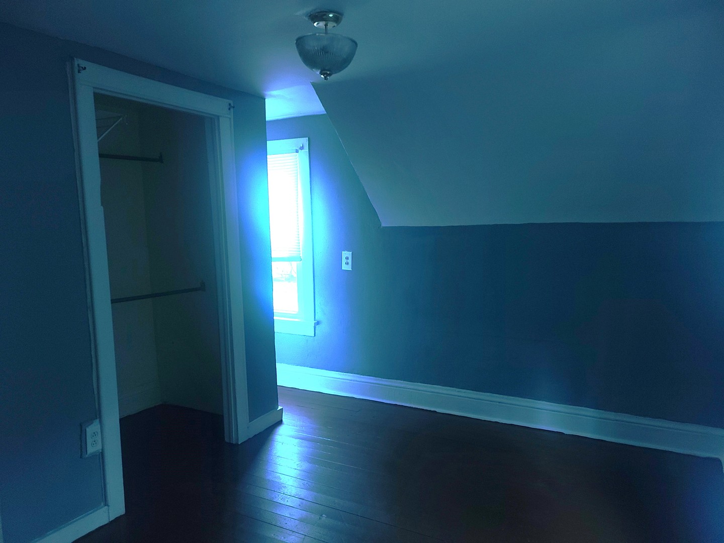 606 South 3rd Street Rochelle, IL 61068 - Photo 14 of 18 an empty room with wooden floor and windows