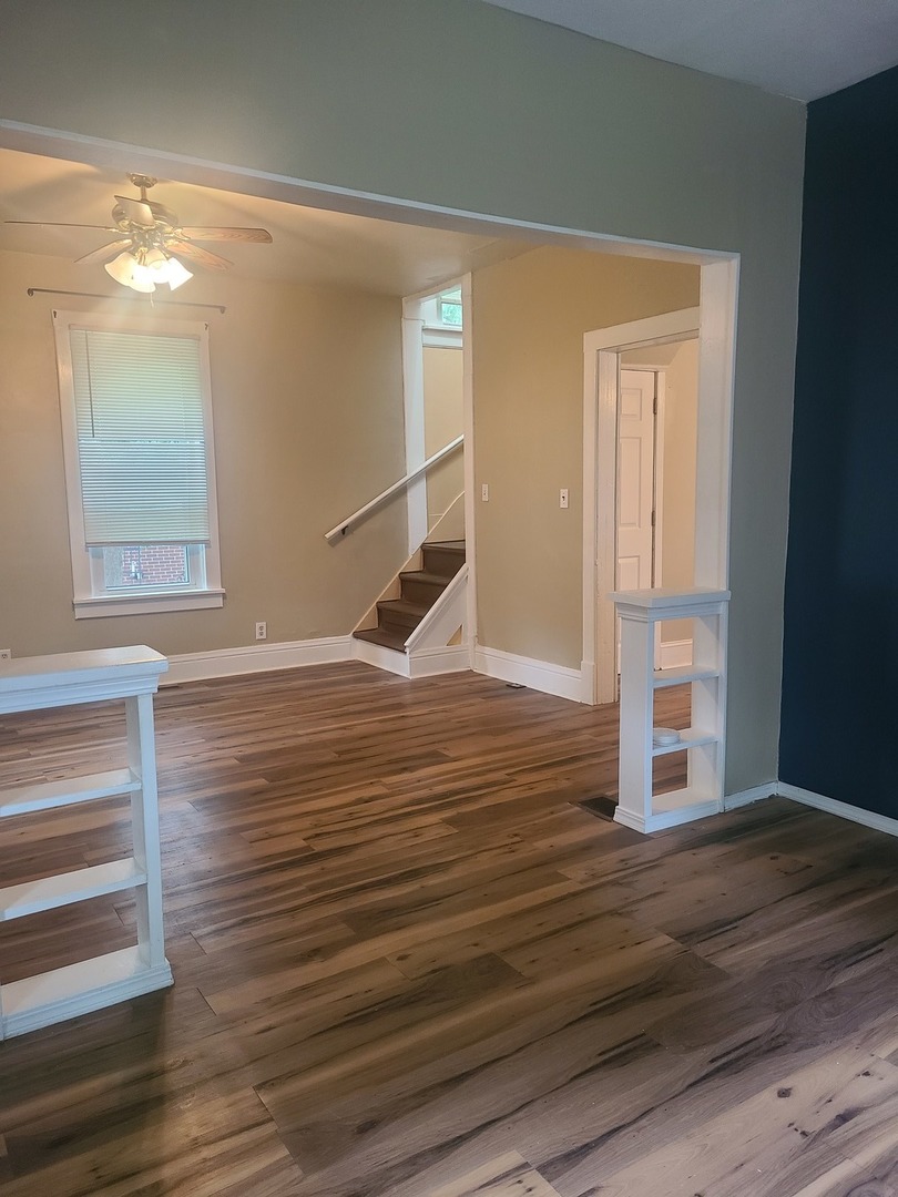 606 South 3rd Street Rochelle, IL 61068 - Photo 5 of 18 a view of wooden floor and windows in a room