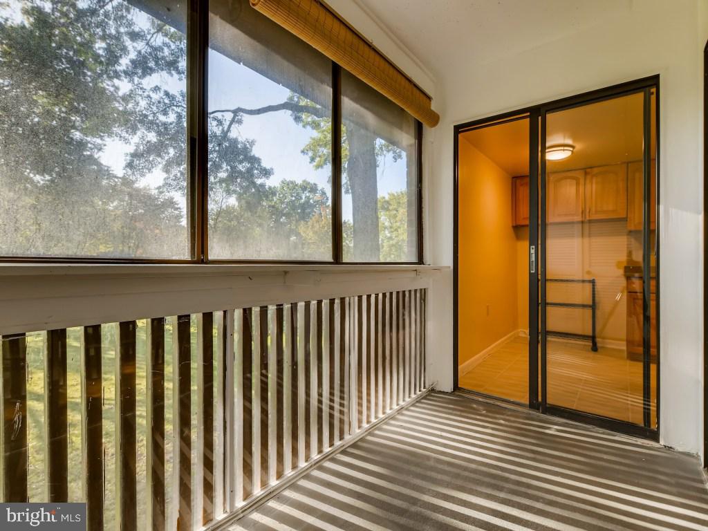 5255 West Running Brook Road, Unit 202 Columbia, MD 21044 - Photo 9 of 12 Enclosed porch