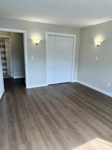 a kitchen with stainless steel appliances a stove a microwave sink and cabinets
