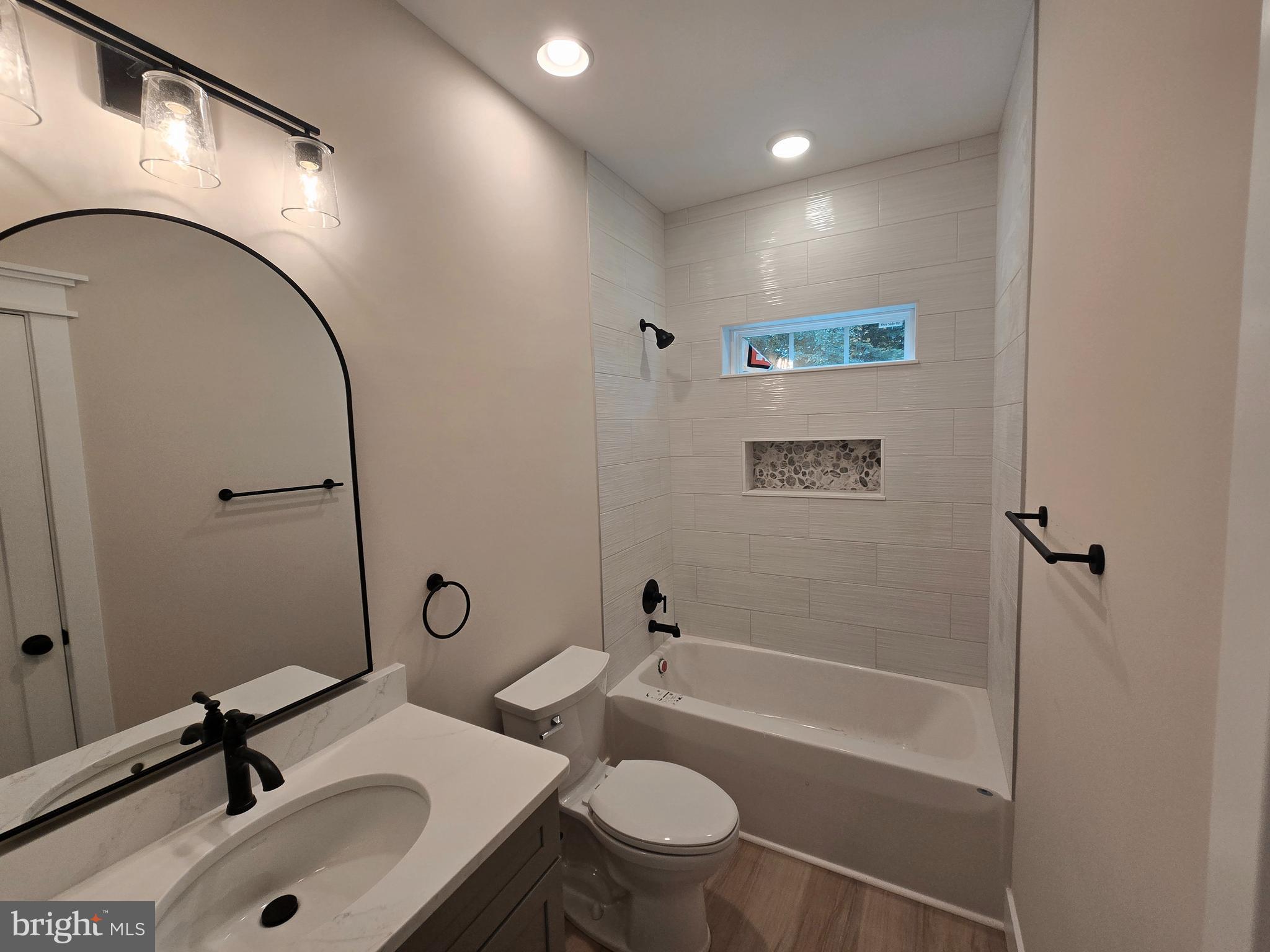 26707 Shortly Road Georgetown, DE 19947 - Photo 25 of 35 a bathroom with a sink toilet and shower