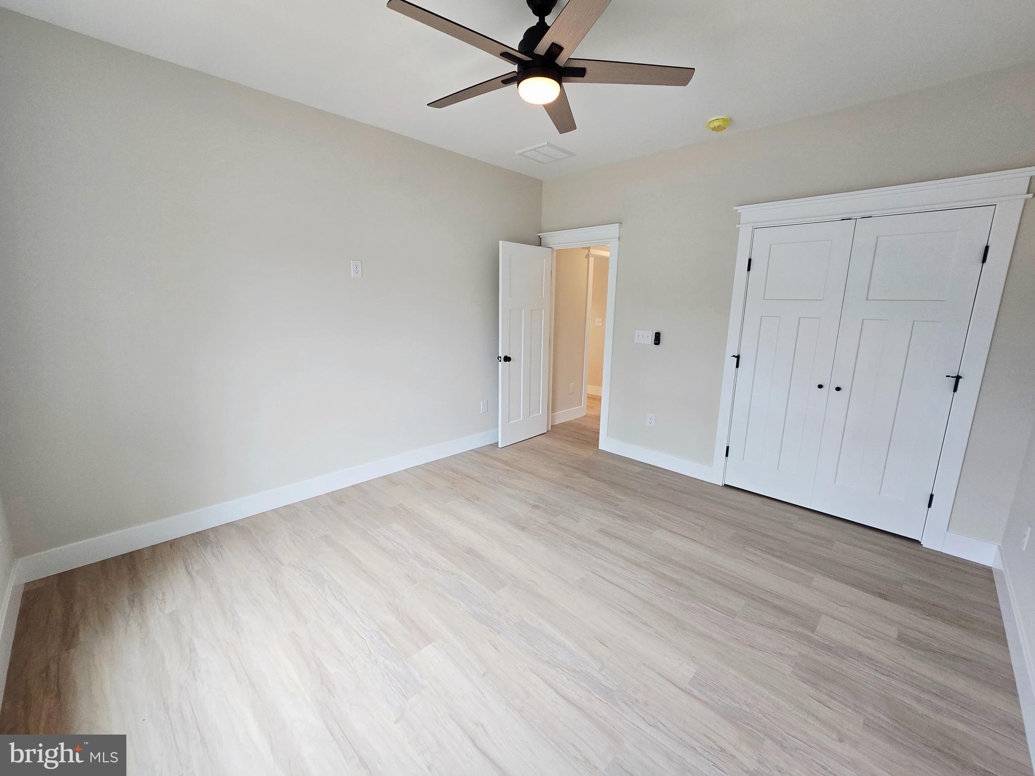 26707 Shortly Road Georgetown, DE 19947 - Photo 26 of 35 wooden floor in an empty room