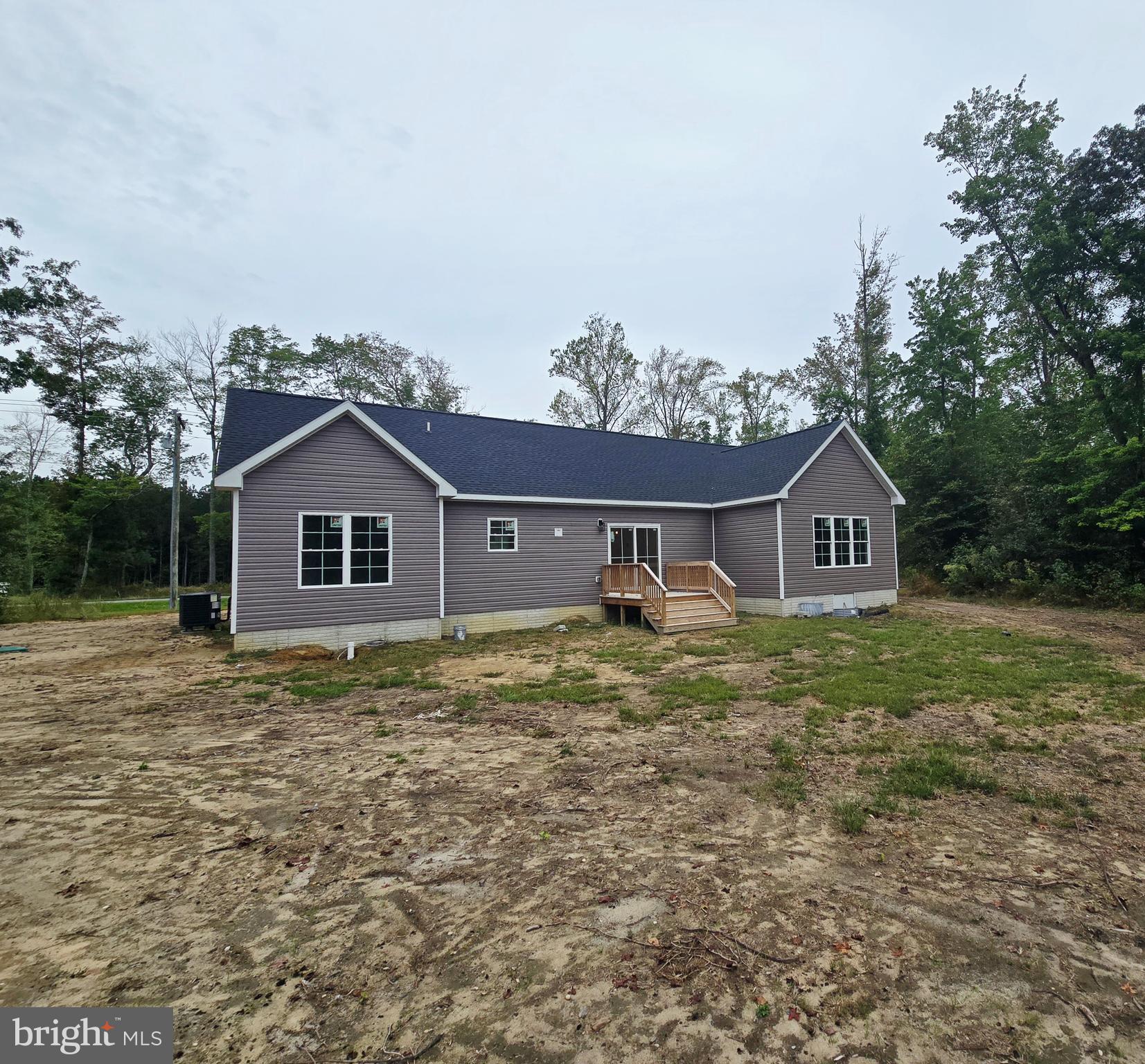 26707 Shortly Road Georgetown, DE 19947 - Photo 31 of 35 a view of a house with a yard