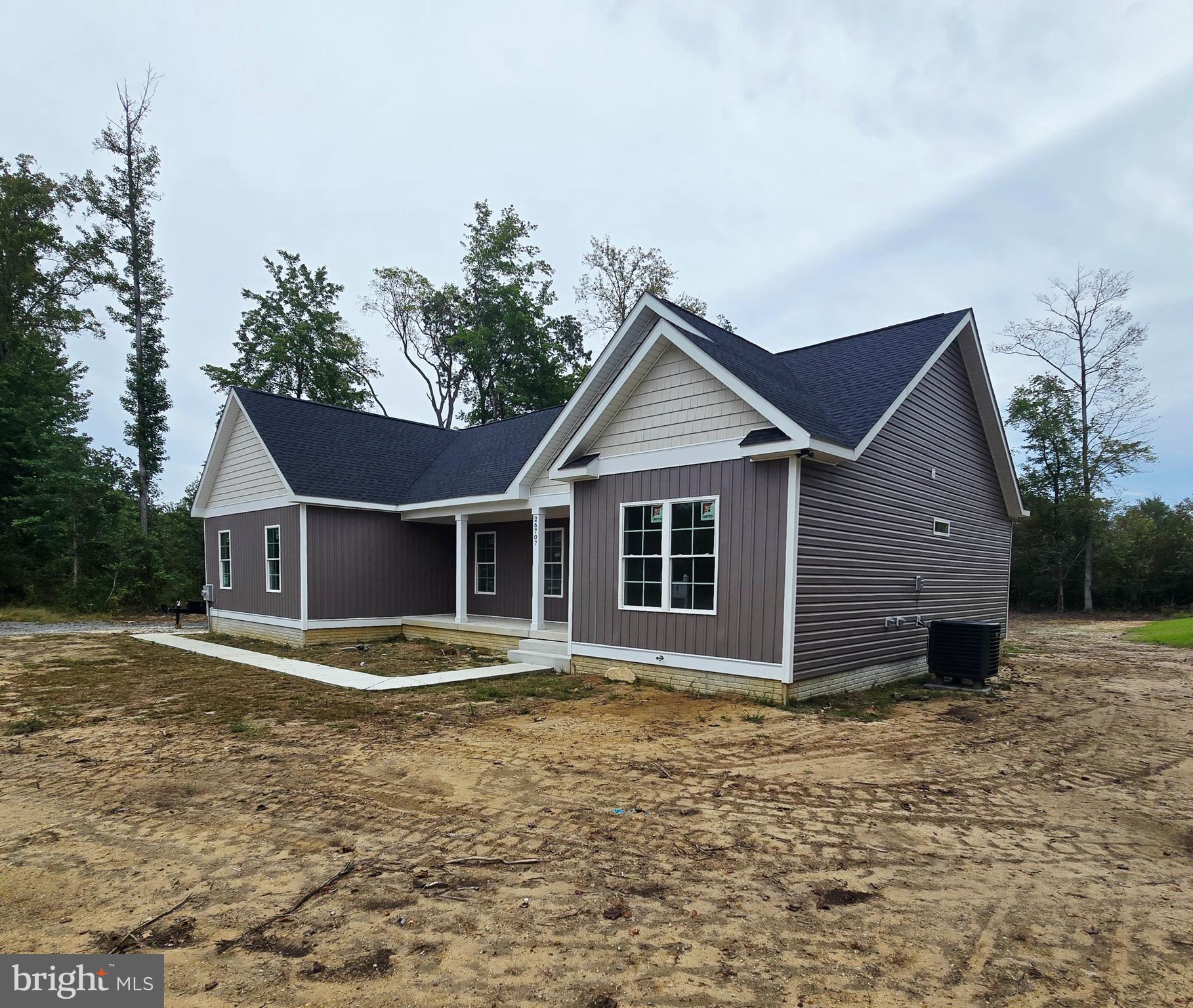 26707 Shortly Road Georgetown, DE 19947 - Photo 32 of 35 a front view of a house with garden