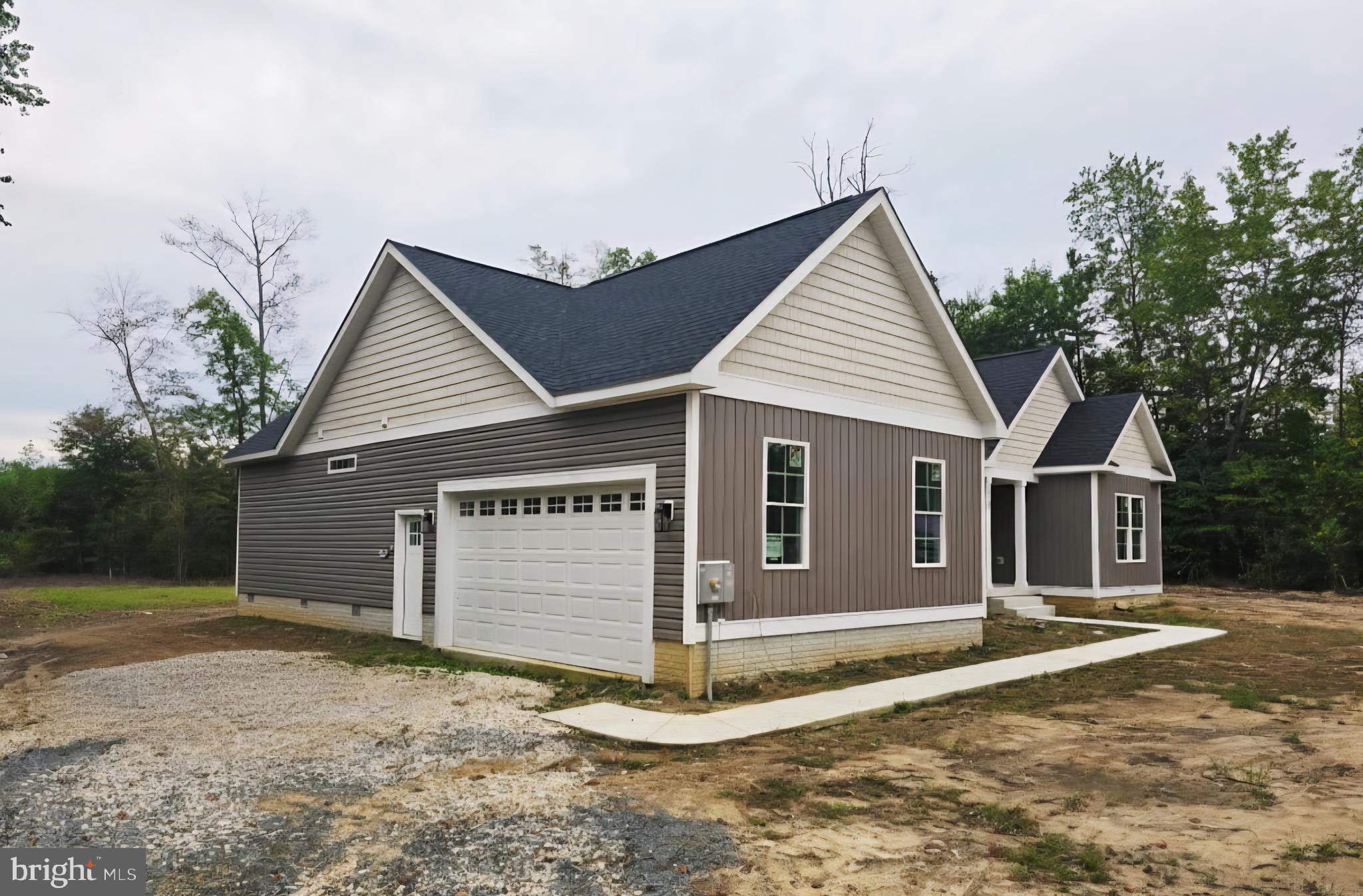 26707 Shortly Road Georgetown, DE 19947 - Photo 4 of 35 front view of a house