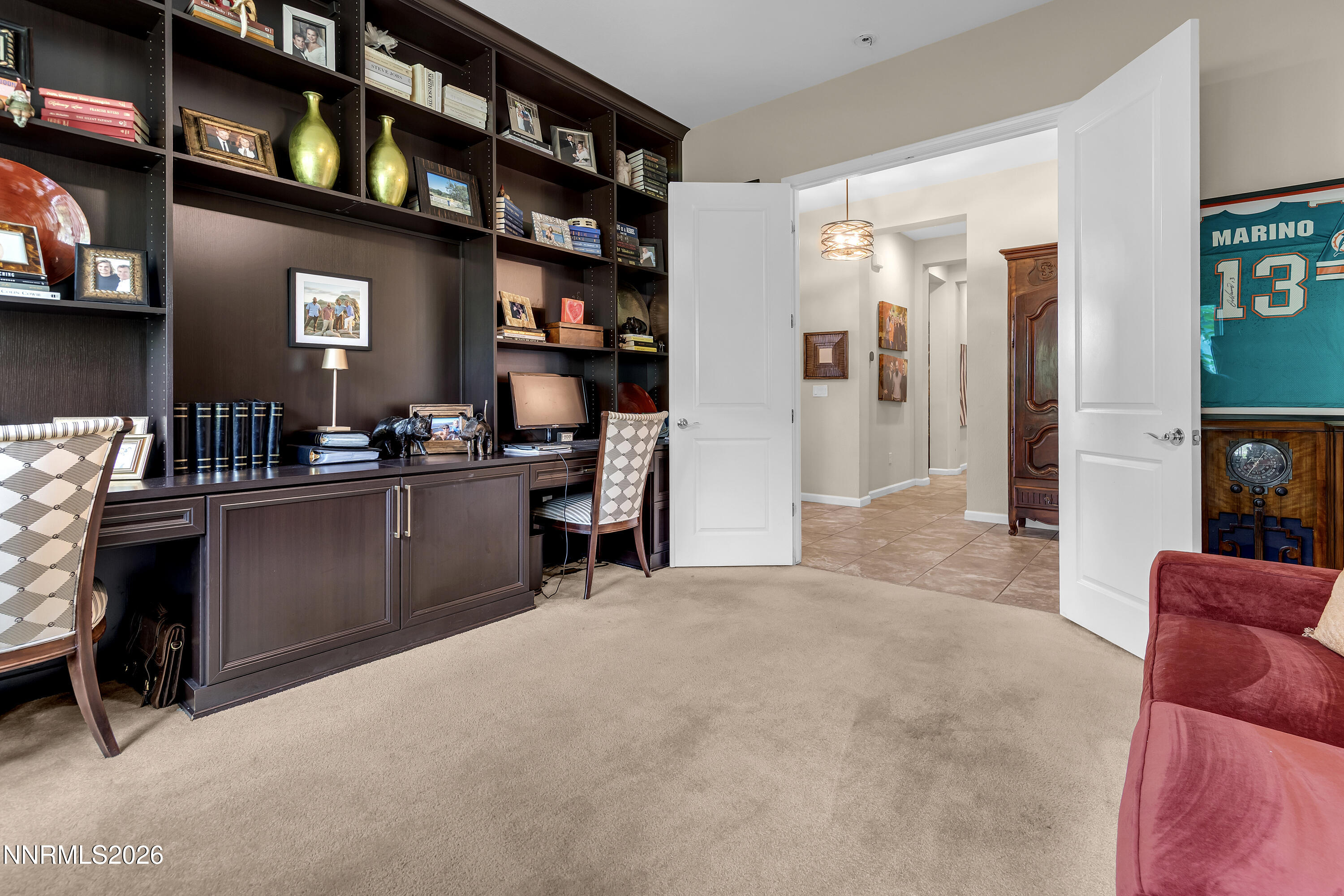 9021 Iron Sky Court Reno, NV 89523 - Photo 16 of 39 a livingroom with workspace and a couch