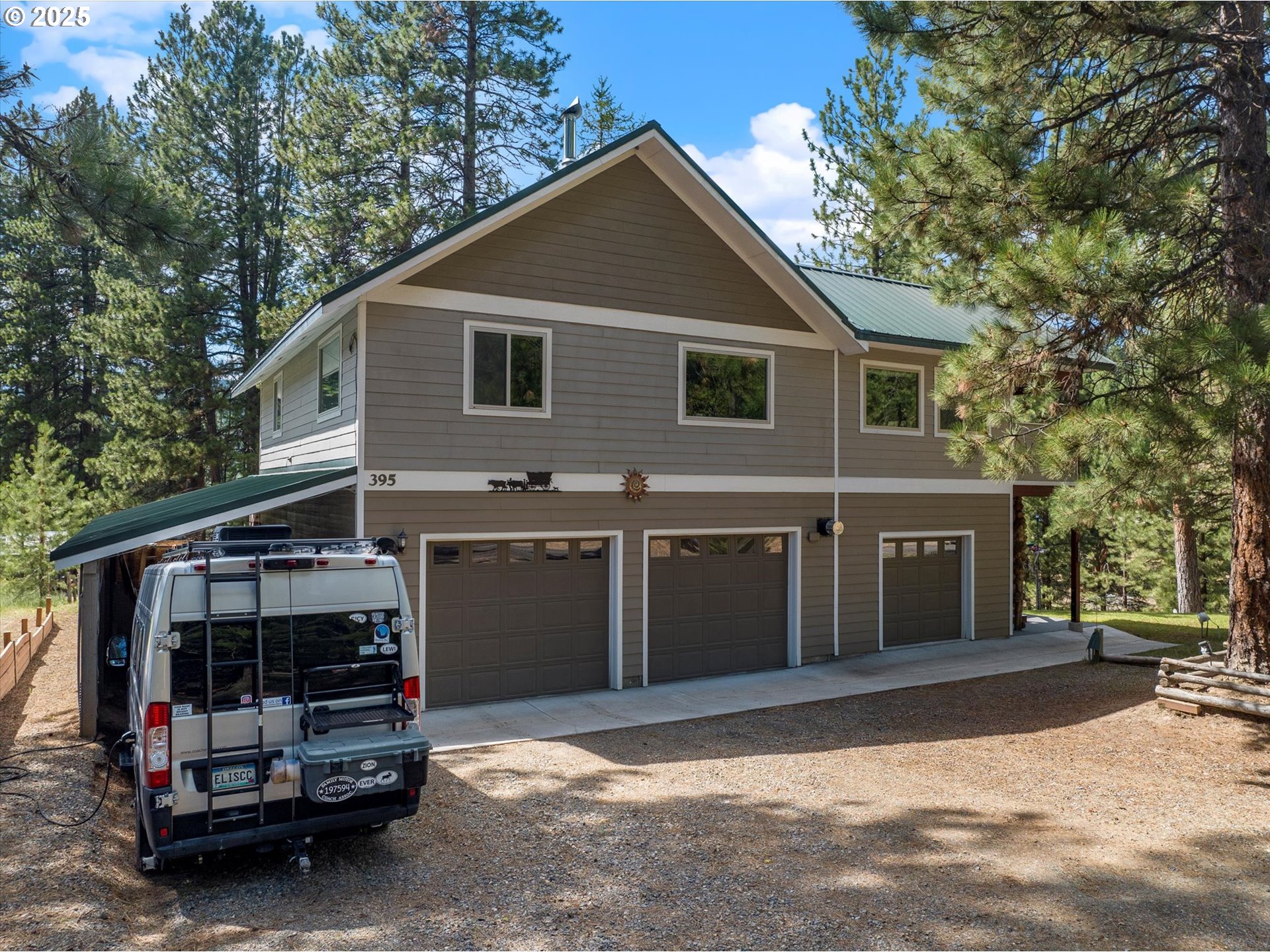 395 Bonanza Street Sumpter, OR 97877 - Photo 1 of 39 a front view of a house with a garage