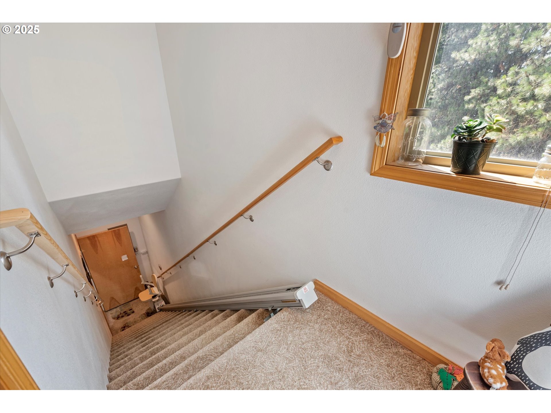 395 Bonanza Street Sumpter, OR 97877 - Photo 23 of 39 a view of an empty room and wooden floor