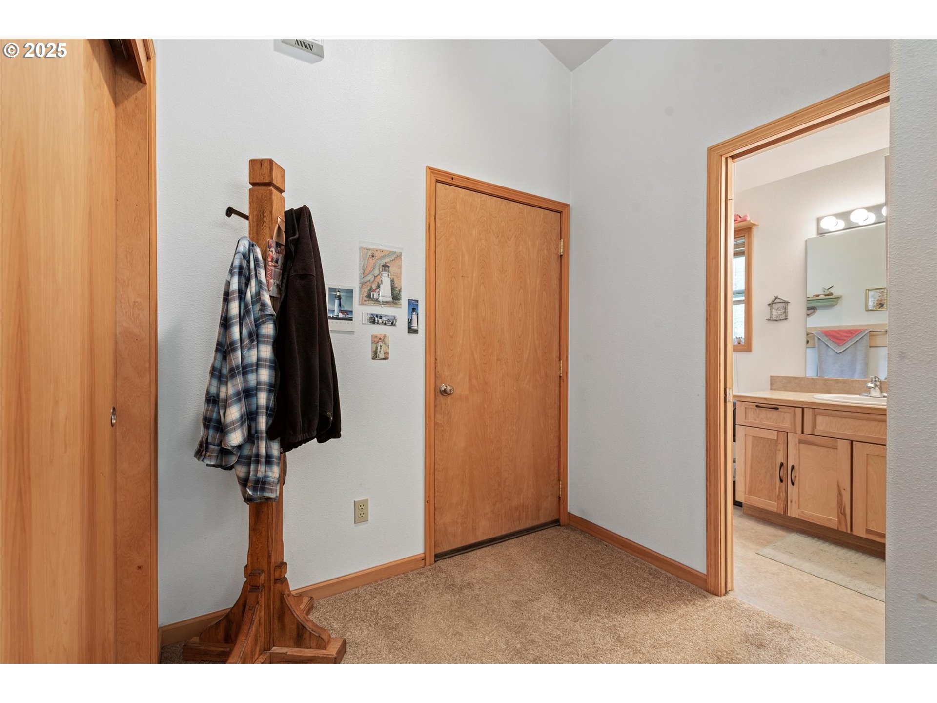 395 Bonanza Street Sumpter, OR 97877 - Photo 27 of 39 a living room with furniture and a walk in closet