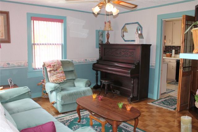 466 Howell Hill Road Kelso, TN 37348 - Photo 3 of 20 Charming Living Room w/laminate flooring