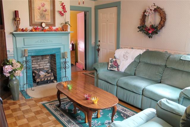 466 Howell Hill Road Kelso, TN 37348 - Photo 4 of 20 Fireplace, too with new gas logs!
