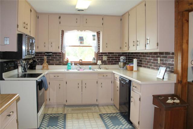 466 Howell Hill Road Kelso, TN 37348 - Photo 5 of 20 Attractive Kitchen with custom brick backsplash