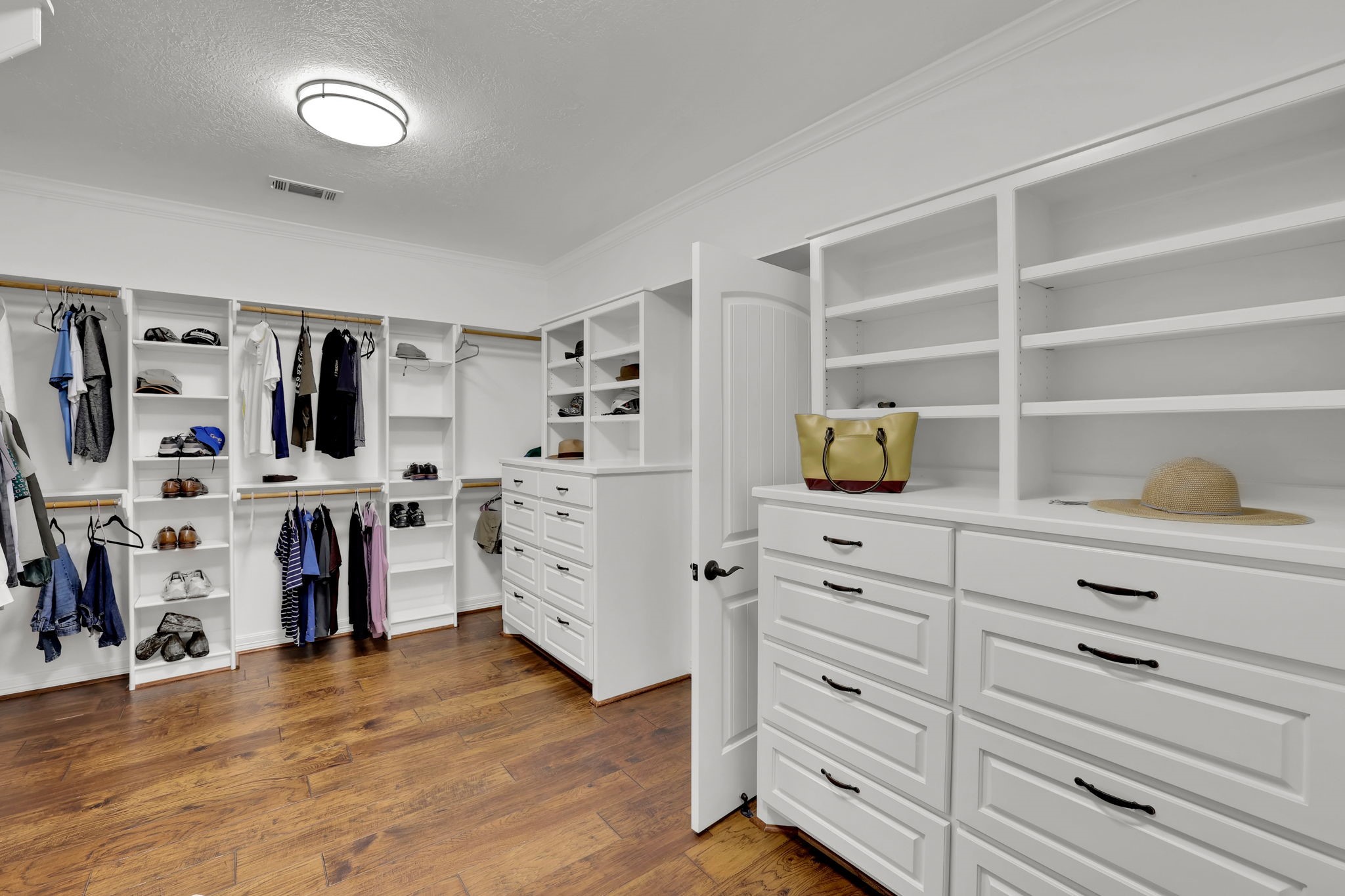 260 Legacy Blvd Point Point Blank, TX 77364 - Photo 27 of 46 Oversized primary walk in closet with custom built ins and drawers