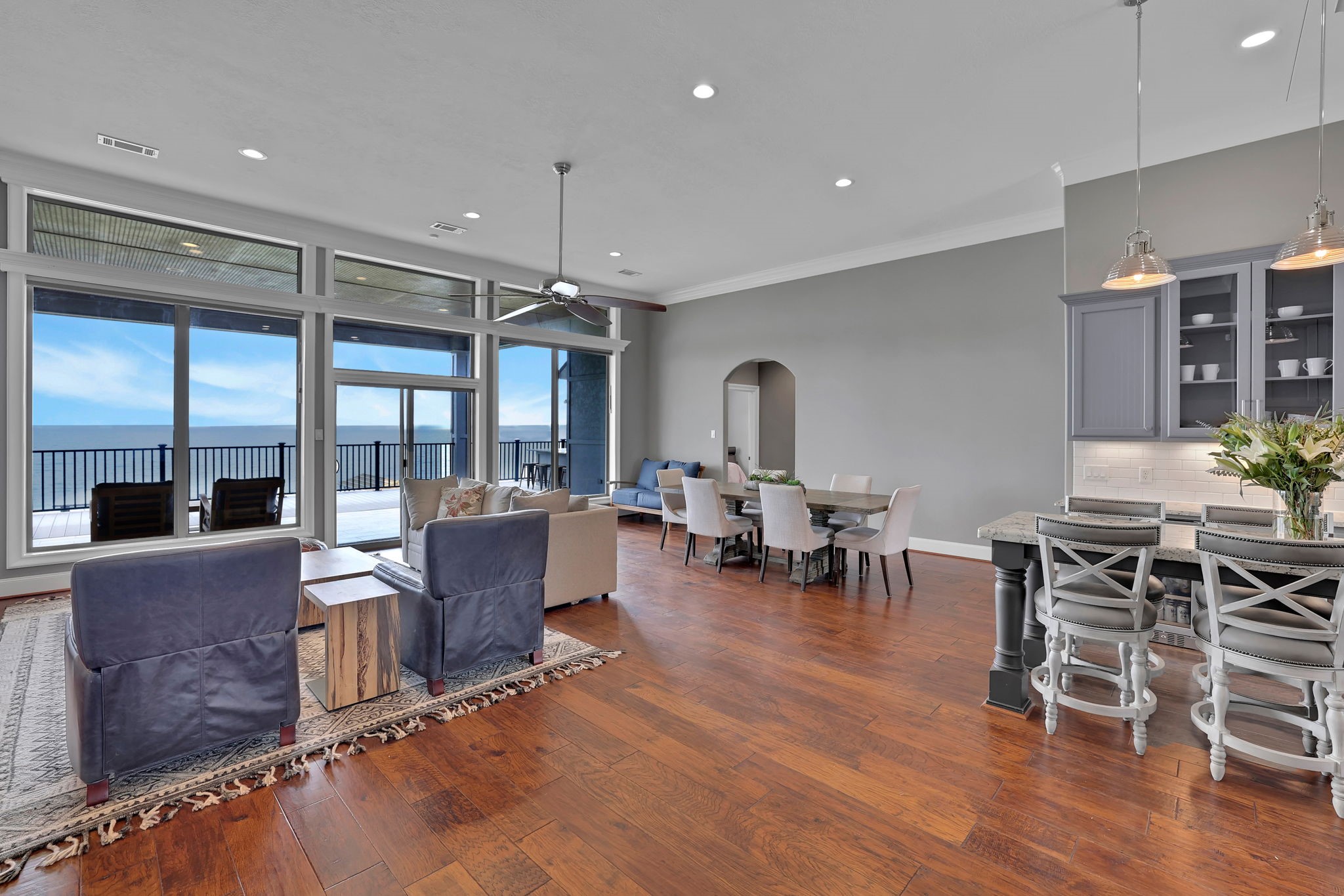 260 Legacy Blvd Point Point Blank, TX 77364 - Photo 5 of 46 The open concept living area features high ceilings and a wall of windows letting in plenty of natural light