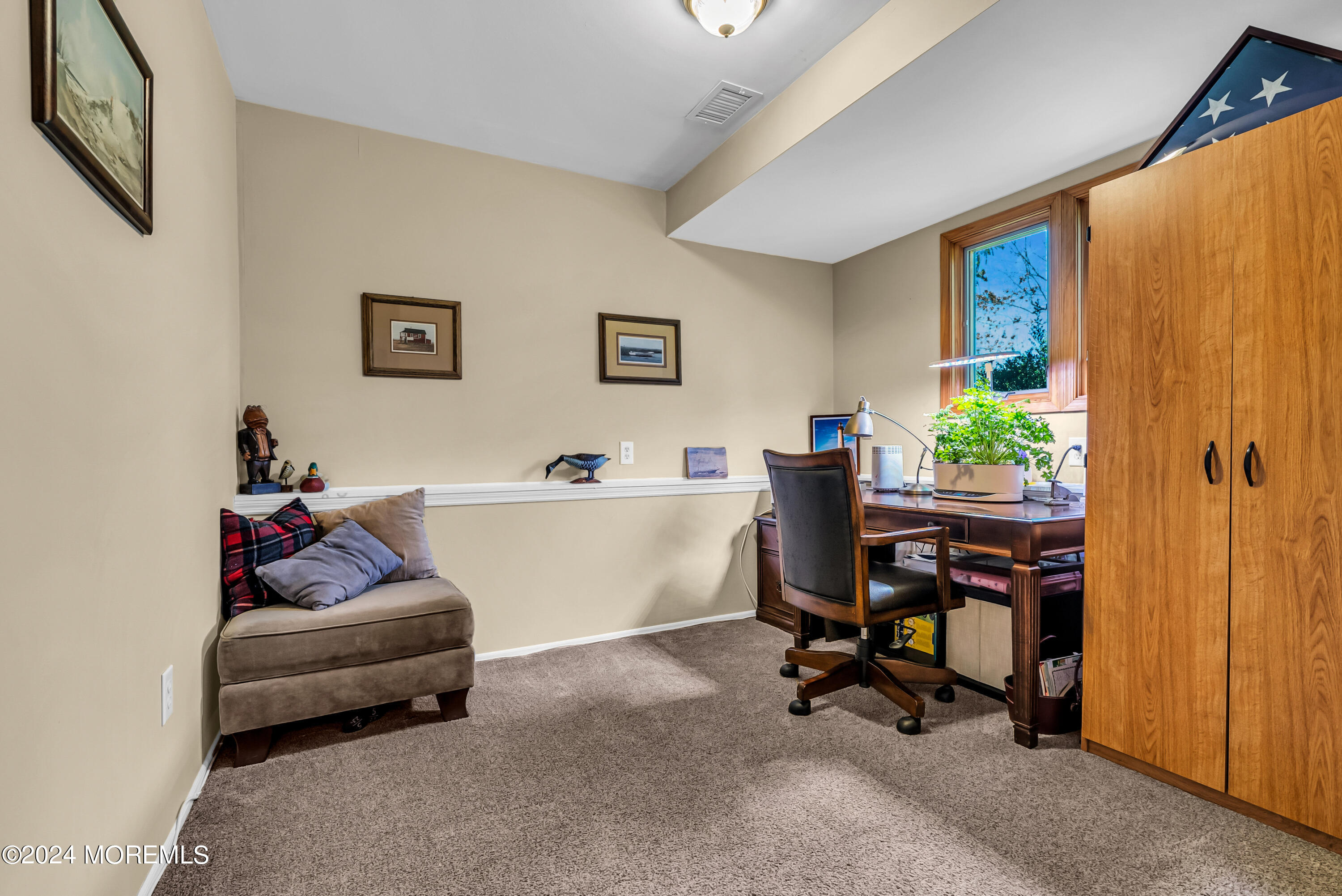 22 Oak Glen Road Toms River, NJ 08753 - Photo 12 of 25 a view of a livingroom with workspace and a couch