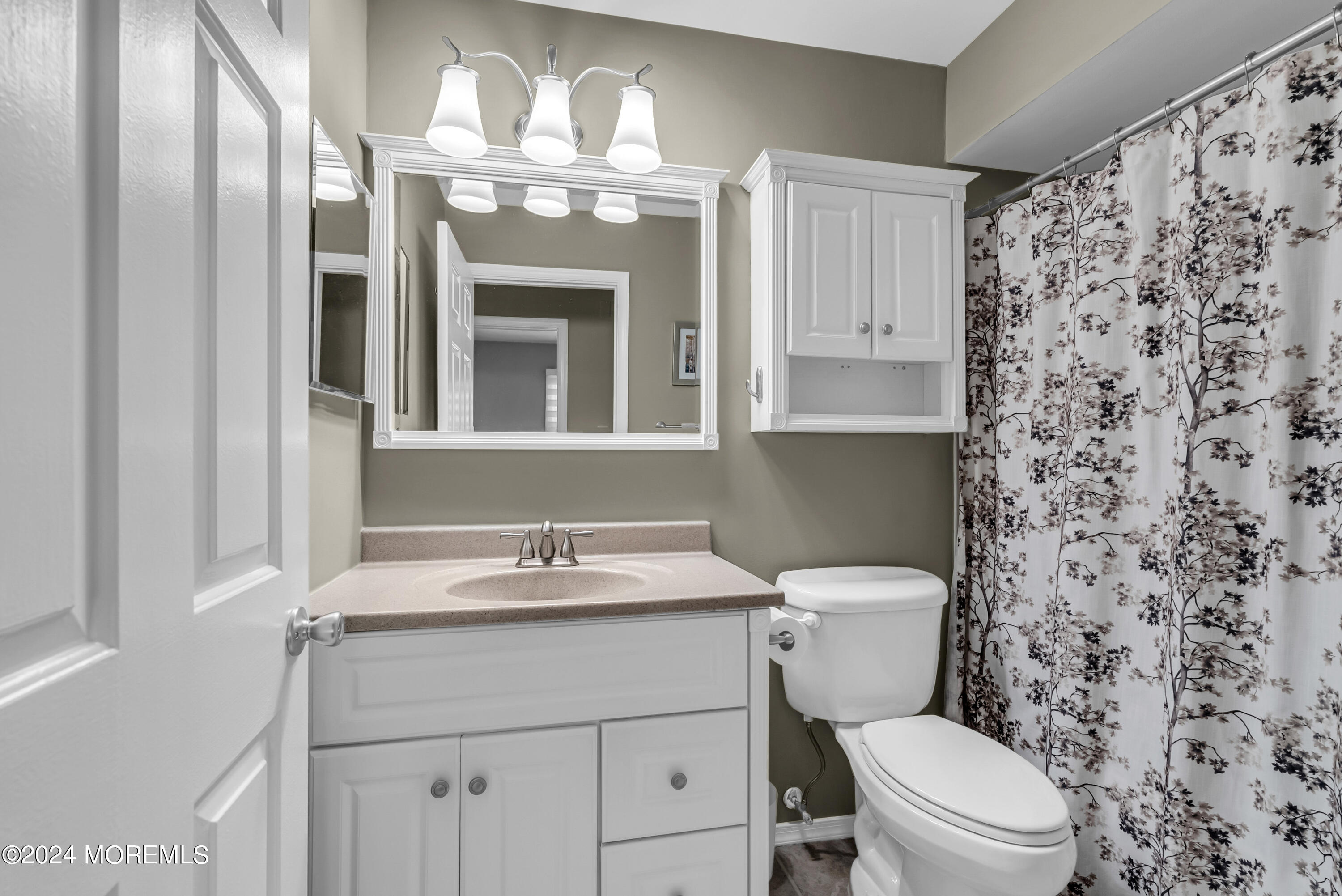 22 Oak Glen Road Toms River, NJ 08753 - Photo 15 of 25 a bathroom with a granite countertop toilet sink and mirror