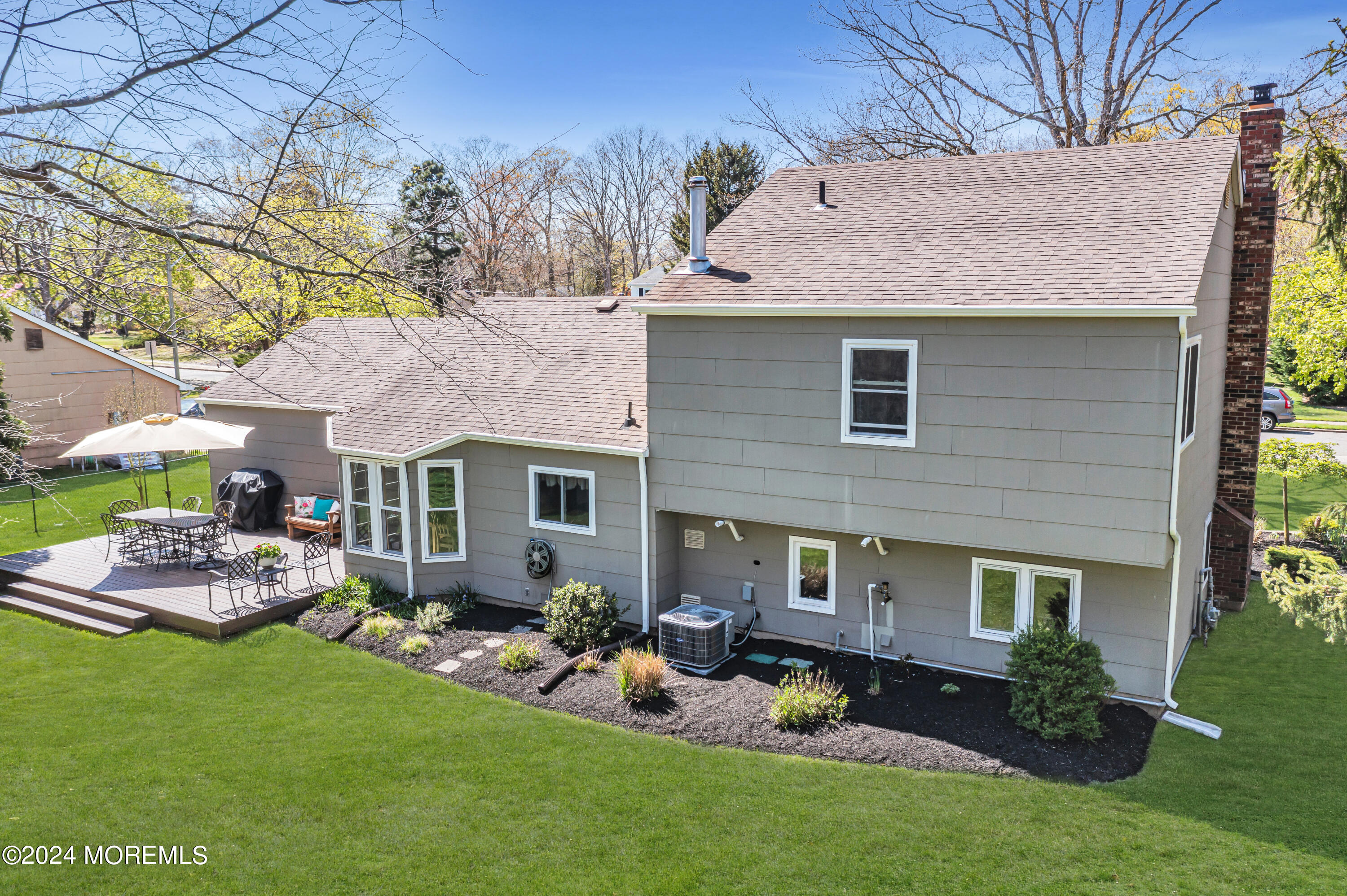 22 Oak Glen Road Toms River, NJ 08753 - Photo 17 of 25 a view of backyard of house with green space