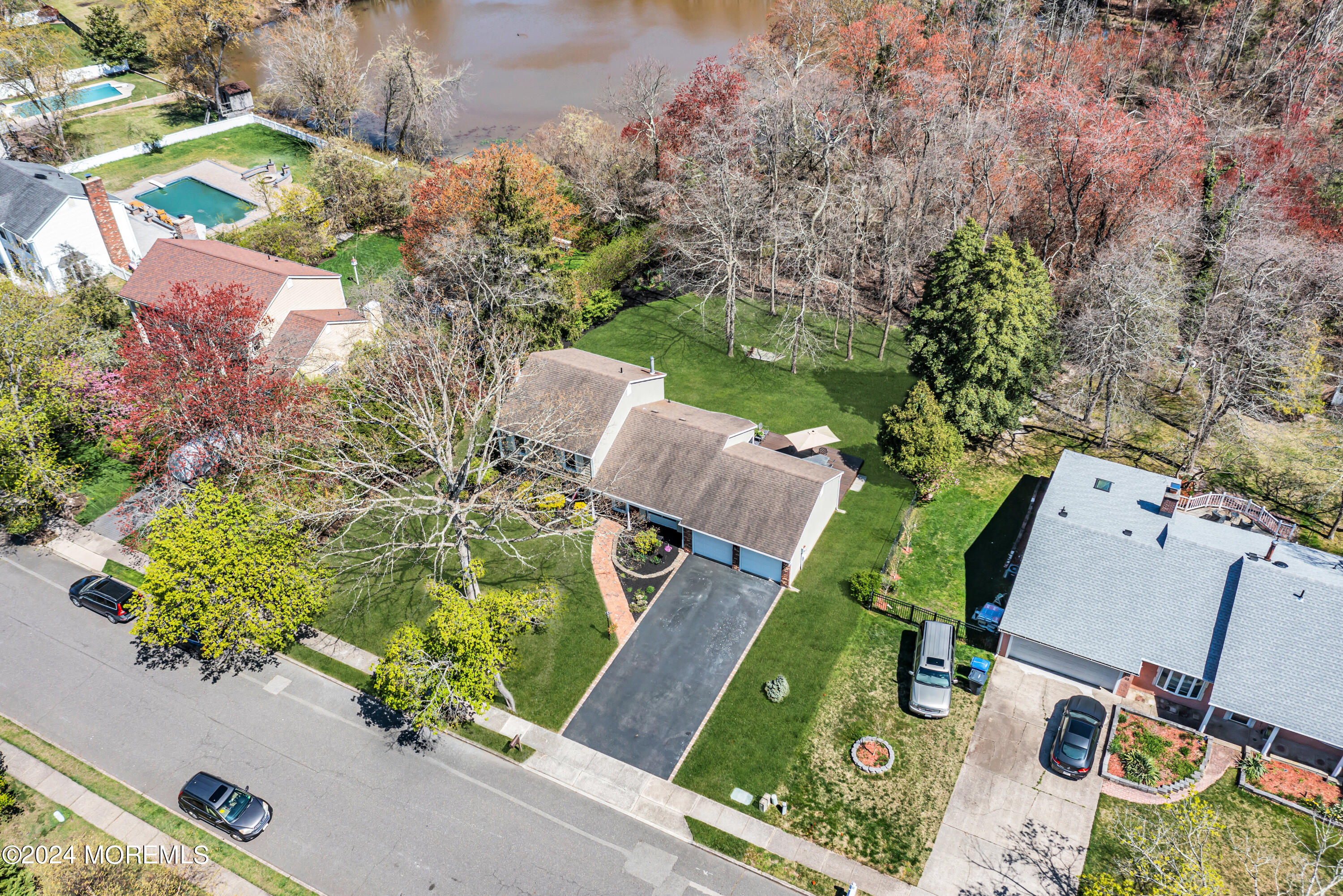 22 Oak Glen Road Toms River, NJ 08753 - Photo 24 of 25 an aerial view of a house with a yard and lake view