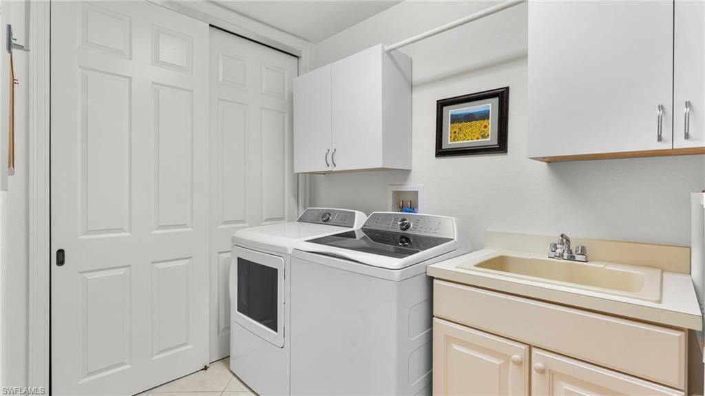 7876 Hawthorne Drive, Unit 1202 Naples, FL 34113 - Photo 26 of 48 Laundry Room